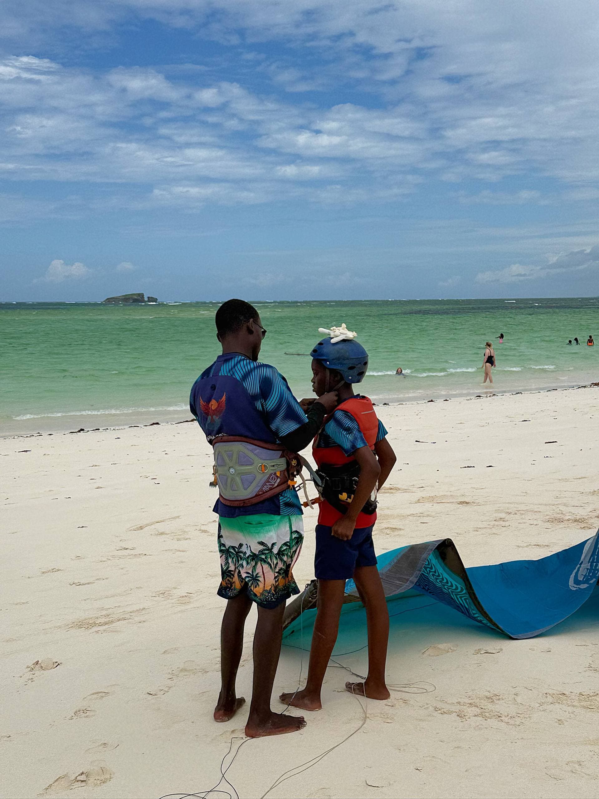 Wind Family scholarship riders on the beach at Watamu